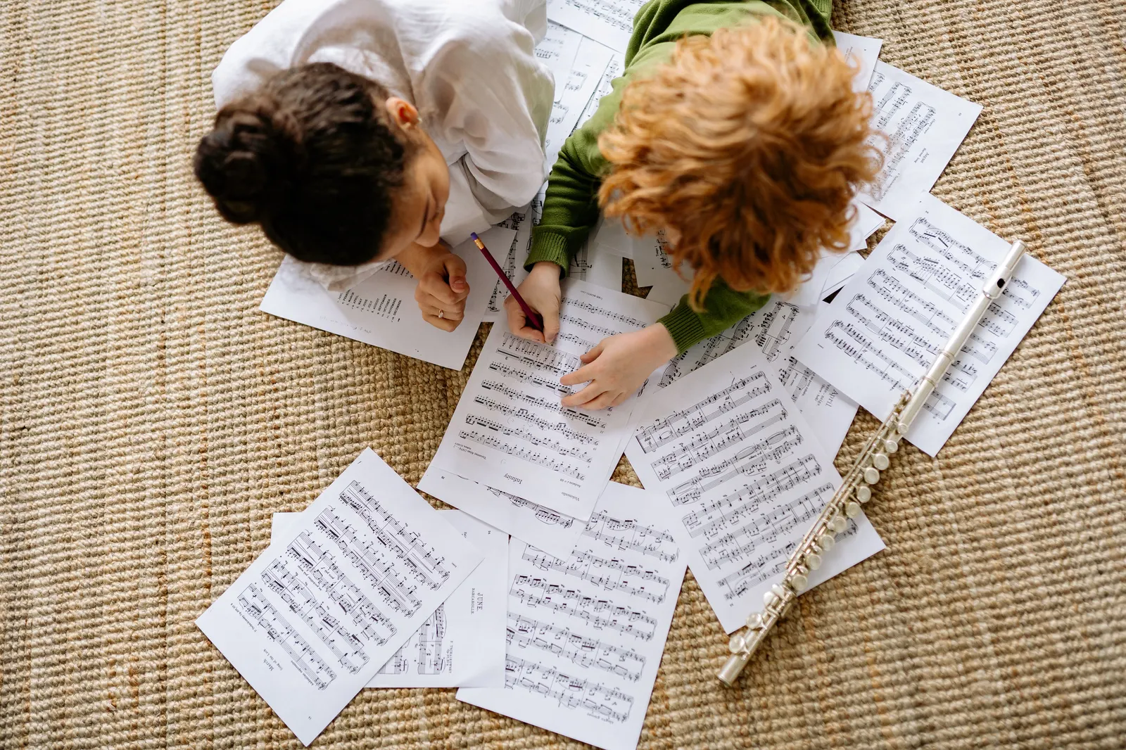 Band students rehearsing with sheet music