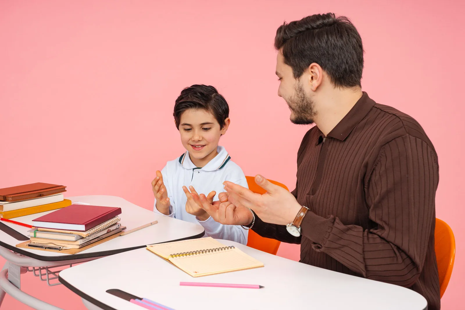 A teacher working one on one with a student