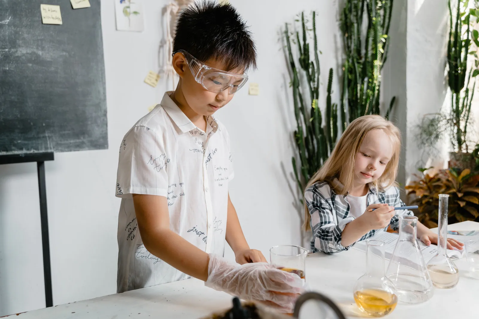 Upper school student in safety goggles during a lab